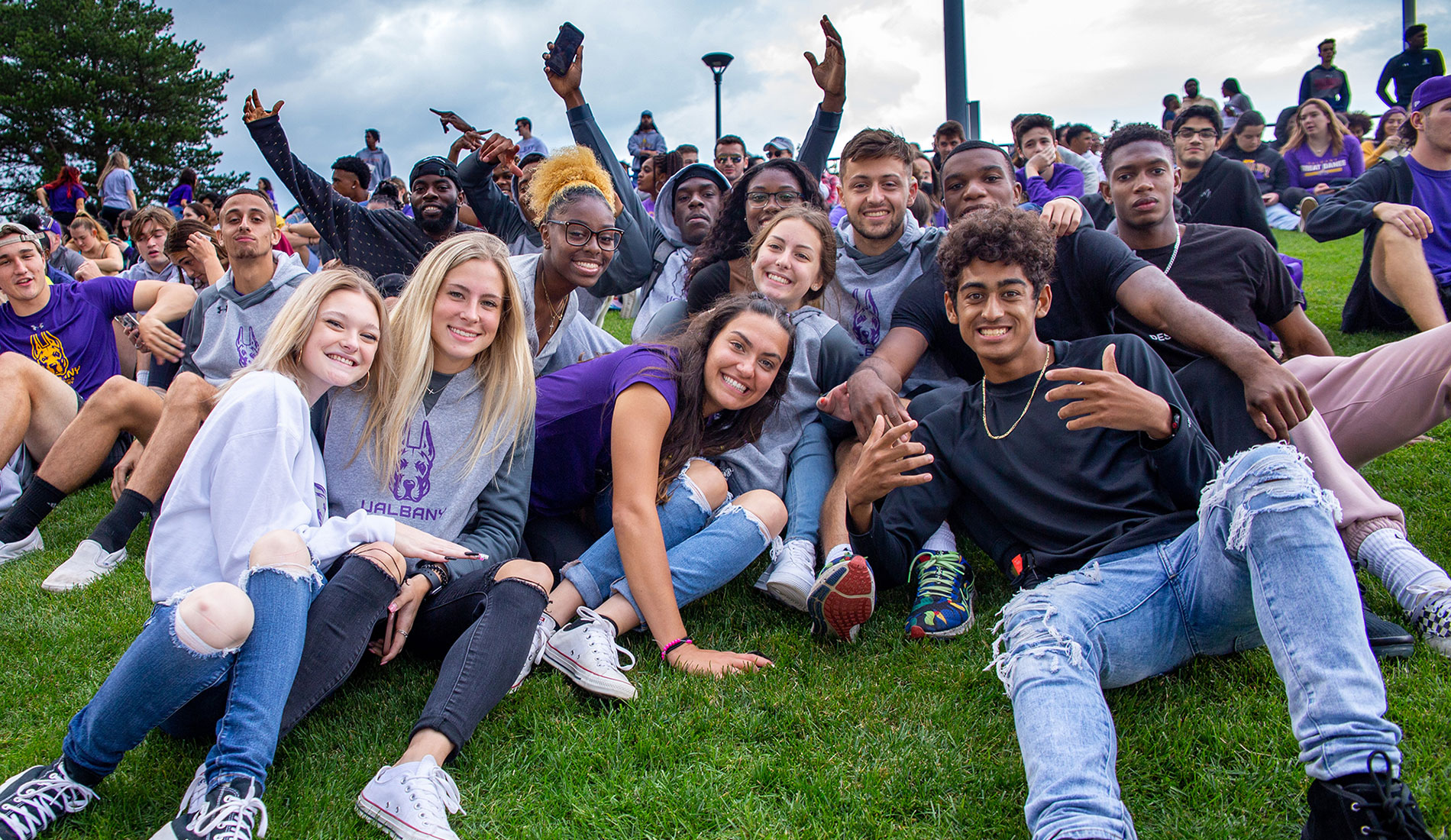 A group of students at a football game.