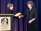 Cheryl Dozier receives award from Vice Provost and Dean of Undergraduate Education Sue Faerman