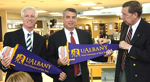The principals from both high schools (Edward Ehmann and John Dolan) get the UAlbany pennants
