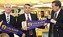 The principals from both high schools (Edward Ehmann and John Dolan) get UAlbany pennants