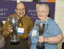 Mel Horowitz 61 and Jacquelyn Gavryck 51 celebrate winning the 2006 Alumni Weekend attendance and membership cups.