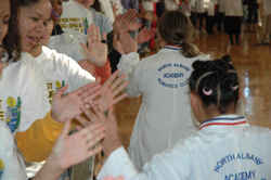 High-fives all around at the Junior FIRST Lego League (JFLL) Expo 