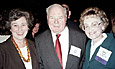 Karen R. Hitchcock, community supporter, John Egan, and IFW Chair Kathy Turek at the 2003 IFW fall dinner.