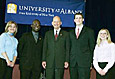 From left to right, Katelynn Murphy, Akintokunbo Akinbajo, Interim President John Ryan, Timothy Quill, Jr., and Tania Petrina.