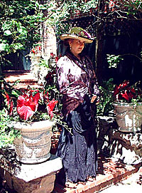 Mary Ellen Shevalier, shown here in a Saratoga Springs garden, plays the elder Marietta Holley in the WPBS documentary. Kate Winter made Shevalier's hat.