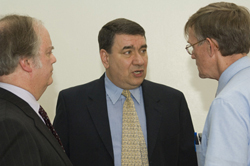 Chair of the Faculty Senate Reed Hoyt, Interim President George M. Philip, and Distinguished Teaching Professor John Delano at the Spring Faculty Meeting