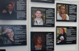 Wall posters show photos of students with information about them