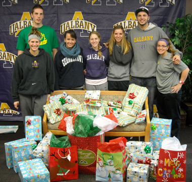 UAlbany student athletes wrap presents for those in need