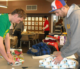 UAlbany students wrap gifts