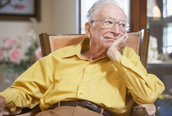 Elderly man seated