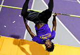 An upside-down star high jumper Matthew Campbell clears the bar