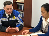 Chatham Police Chief Peter Volkmann and professor Tomoko Udo meet as part of their partnership on the Chatham Cares 4 U program.