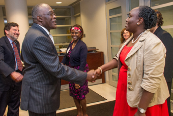 UAlbany President Robert Jones greets a delegation from Kenya