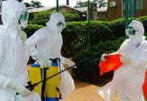 health workers fight Ebola
