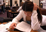 A student at work in UAlbany's Main Library