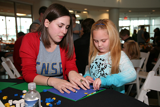 A girl learning about nanotechnology at Nanocommunity Day in 2010