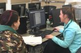 Business MS students assist others during tax season.