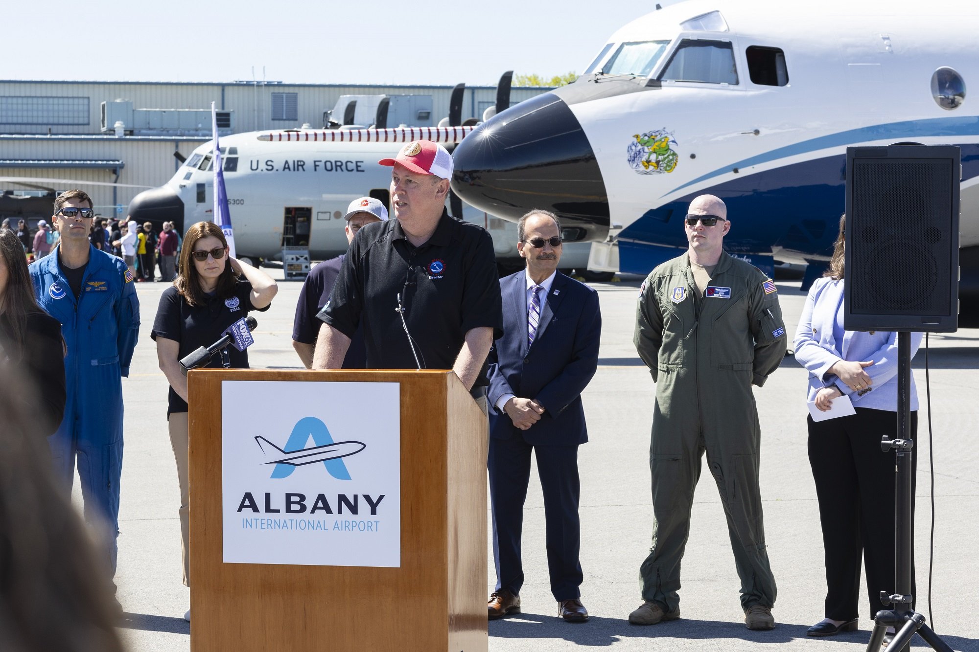 Weather and emergency management officials host a press conference at the Albany International Airport.