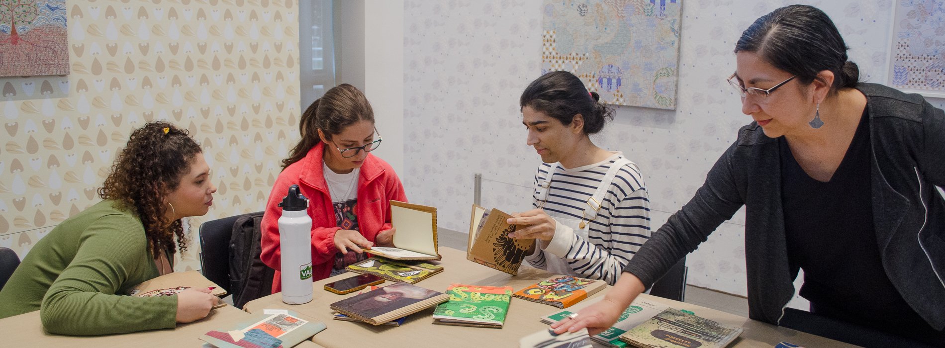 Students participating in a book making workshop