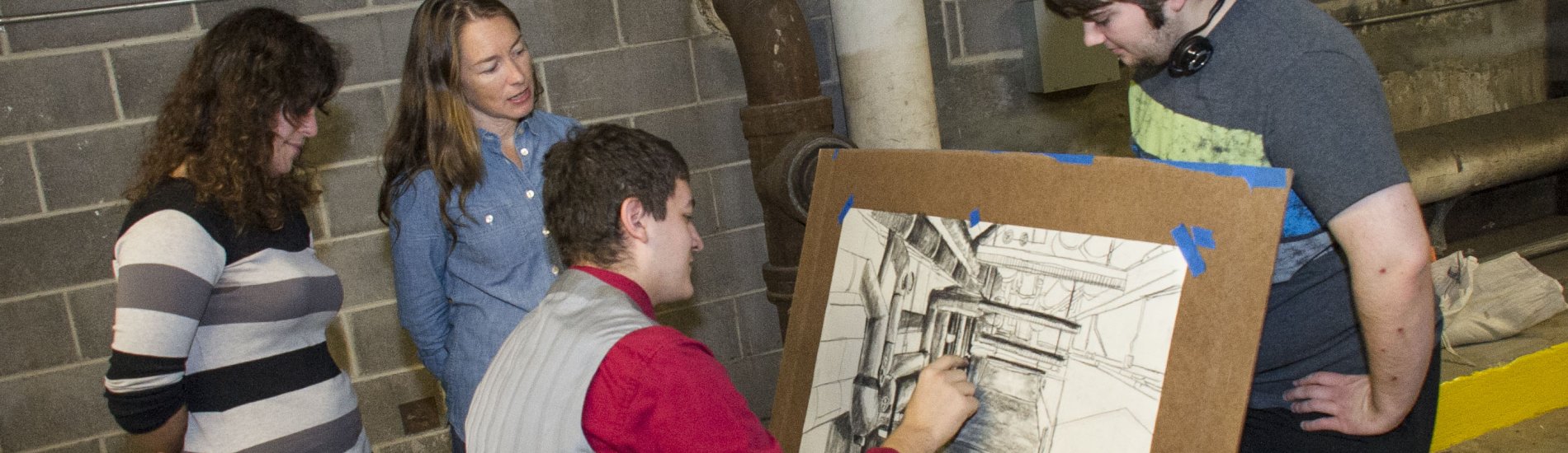 A group of students in an art drawing class.