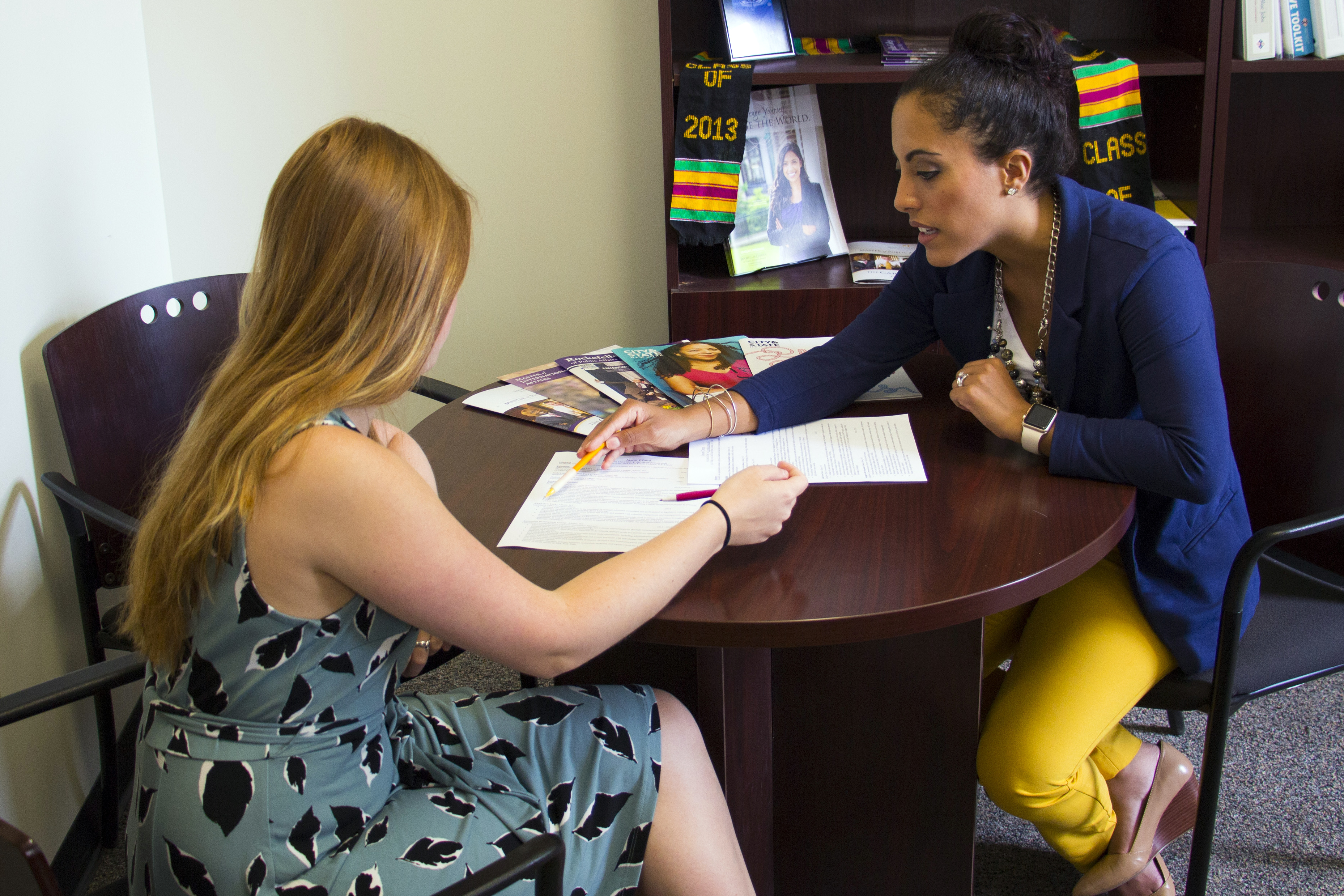 Yalitza Negron, Director of Internships and Career Services, consulting with a student