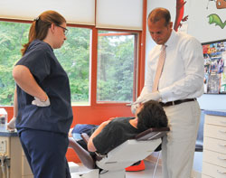 Dr. Capolongo examines one of his patients