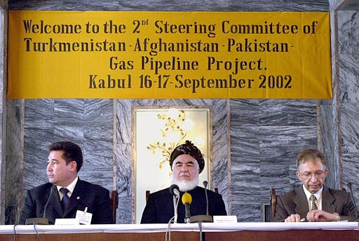 Photo of the 09/2002 gas pipleline project meeting betweem Afghanistan, Turkmenistan, and Pakistan from the AP Photo Archive.