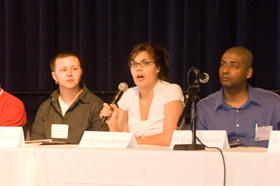 University at Albany student Jennifer Roman, Class of 2008, center, speaks at a panel discussion of students from around the state.
