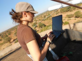 Mariya Zheleva's work in next-generation wireless networks takes her to remote locations all over the world. Here she is one top of a water tower during a field trip to Macha, Zambia, configuring a base station for a cellular network. (Photo courtesy of Mariya Zheleva) 