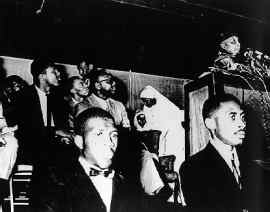 Elijah Muhammad addressing his followers.