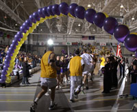 Big Purple Growl Men's Basketball Players