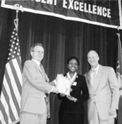 Amma Agyemang receiving the New York State Chancellor's Award for Excellence.