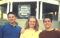 Stephanie Coon, center, in front of the Ronald McDonald House