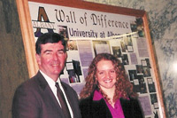 Stephanie Coon with Senator Neil Breslin in front of the "Wall of Difference"