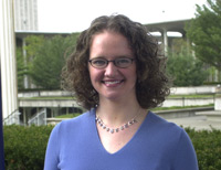 Stephanie Coon on the Academic Podium