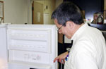 Professor Hirsch checks the fridge