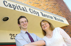 Jeremy Birnbaum stands outside Capital City Rescue Mission with Karen Church