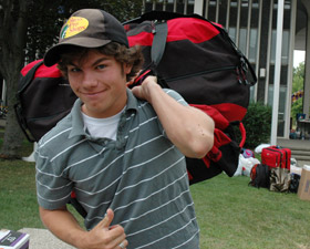 Freshman Billy Kelly of South Kingston, R.I., moves in to State Quad.