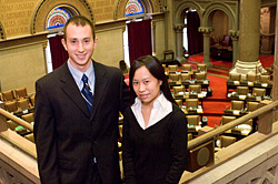 UAlbany student interns Richard Paladino and Donna Yee in the Assembly chamber