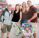 (L. to r.) Dan Doyle &rsquo;97, &rsquo;04; Christy DeLaMater &rsquo;04; Stephanie Ferriero and her husband, Carmen &rsquo;04.
