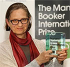 Lydia Davis poses with the Man Booker International Prize upon receiving the award on May 22.