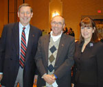 President Hall (L.) and Vice President Deborah Read visit with Jon Richardson 71at an alumni reception in Phoenix.