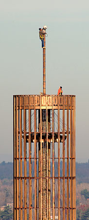 Don't look down: Replacing the aircraft warning lightbulbs is not for those who fear heights.