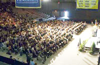 A crowd of approximately 1,500 in the RACC attends Monday's Memorial Tribute to Kermit Hall.