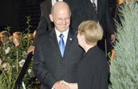 SUNY Chancellor John R. Ryan speaks with Phyllis Hall after the Memorial Tribute to her husband.