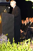 Stan Albrecht, president of Utah State University, addresses the audience.