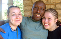 Katie Willis, Rev. Ganza Jean Baptiste, and Abby Taylor