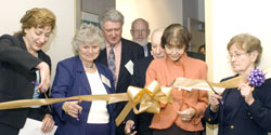 At left, Officer in Charge, Provost and Executive Vice President Susan Herbst cuts the ribbon to open the center.