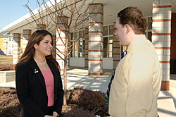 Residence hall workers like Karla Jaime and Justin Smith, above, and Jennifer Alvarez, not shown, handle everything from boosting school spirit to responding to emergencies.