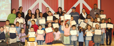 Nakia Hamlett with readers in the after-school program   